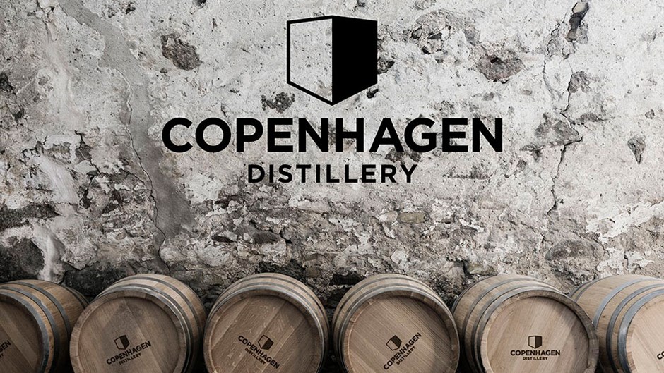 Et billede af tønder og copenhagen distillerys logo